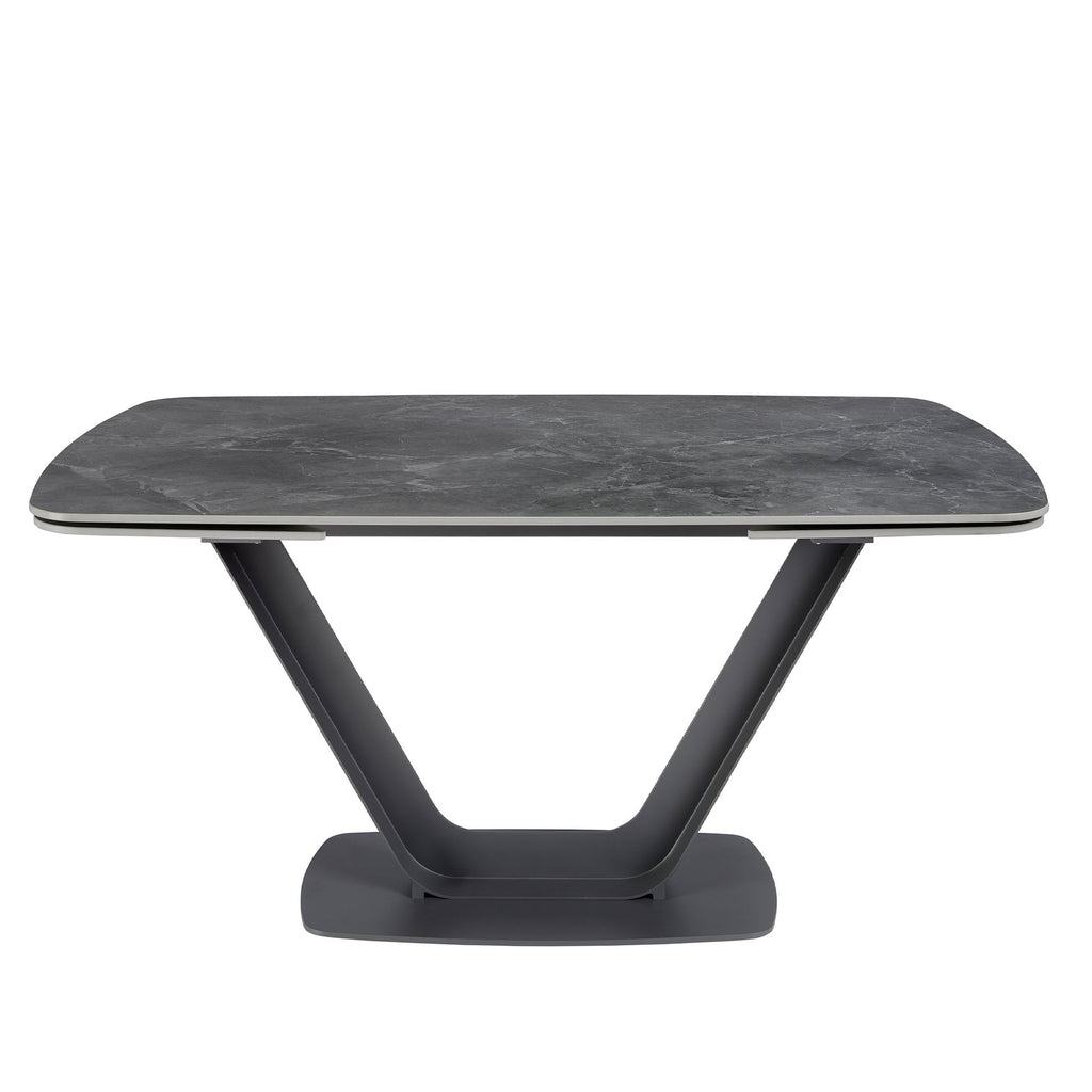Mesa comedor extensible ovalada barril mármol porcelánico y acero negro