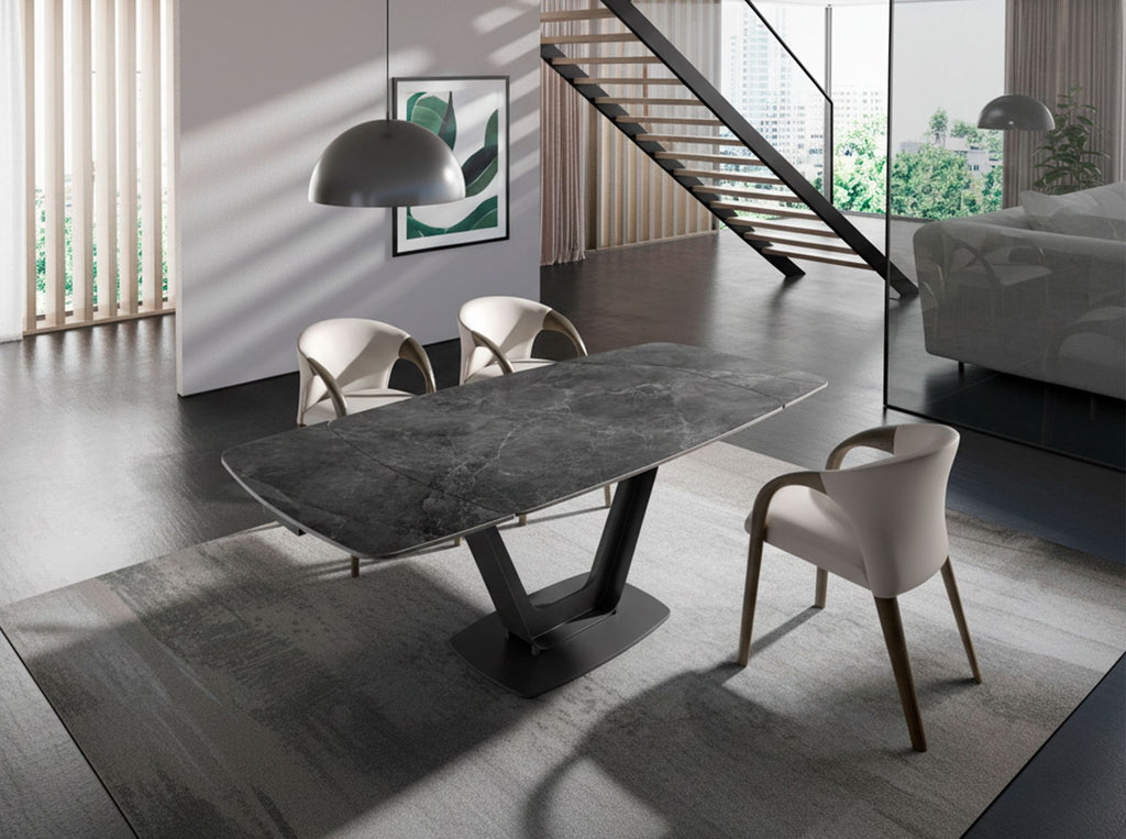 Mesa comedor extensible ovalada barril mármol porcelánico y acero negro