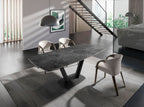 Mesa comedor extensible ovalada barril mármol porcelánico y acero negro