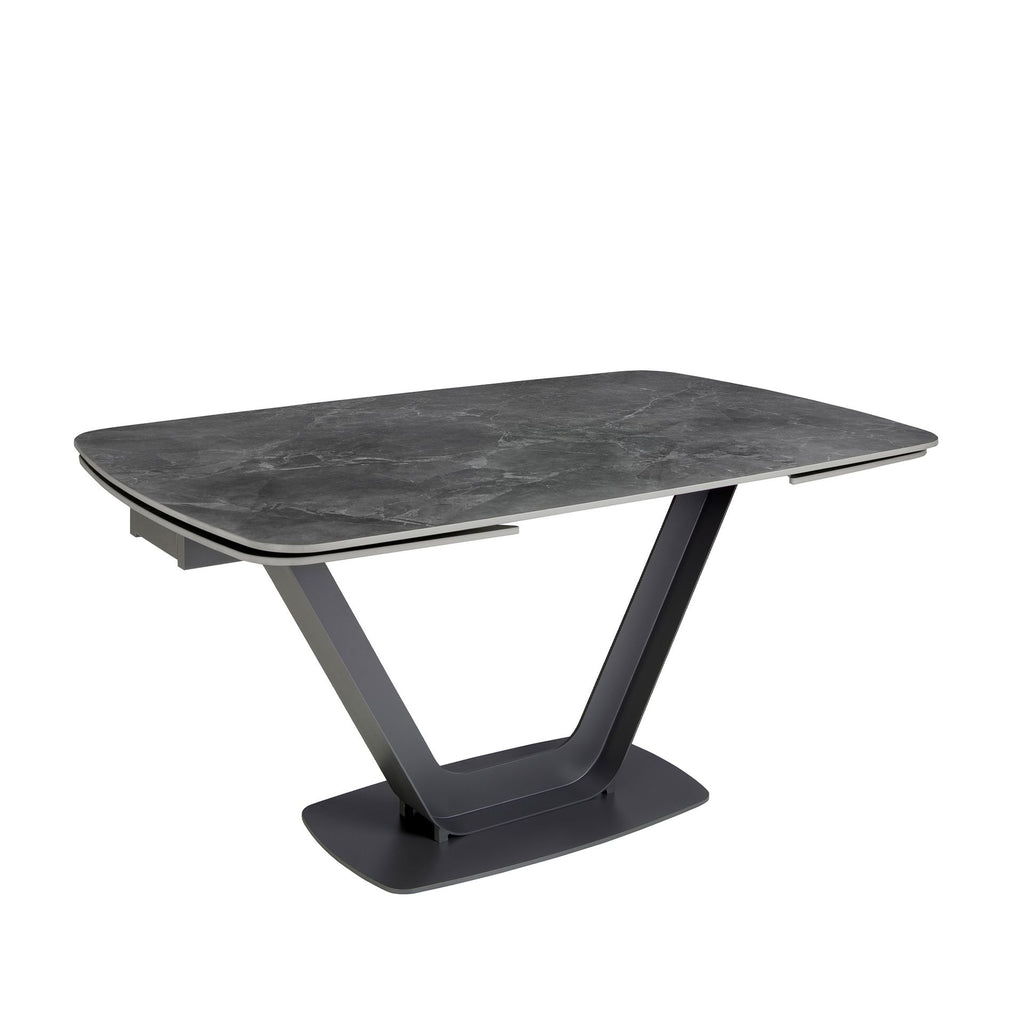 Mesa comedor extensible ovalada barril mármol porcelánico y acero negro