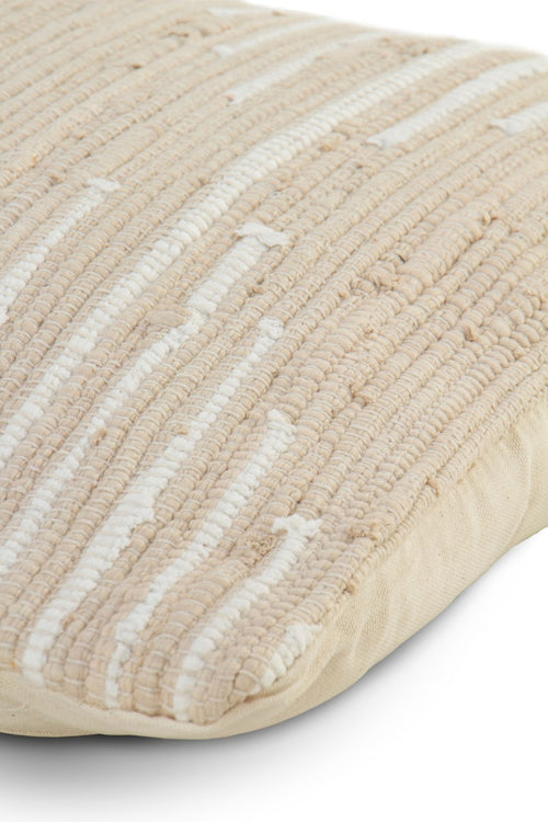 Detalle de la trama del cojín de algodón beige