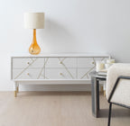 MUEBLE TV 6 CAJONES LACADO EN BLANCO CON FRONTIS DECORADO EN ORO